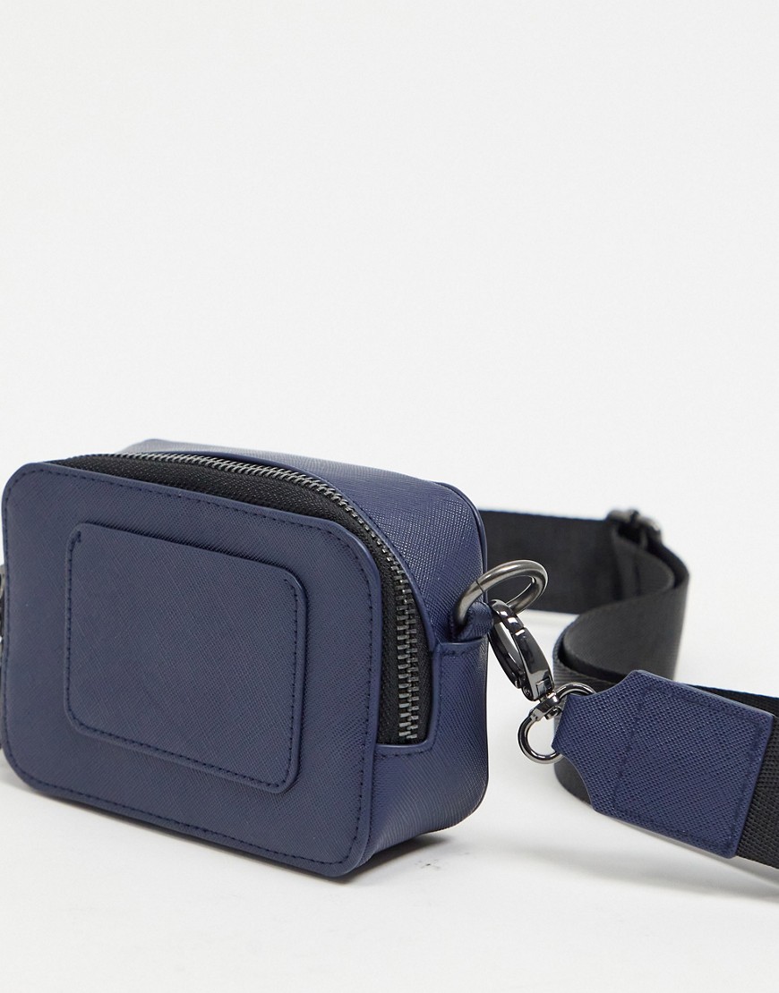 ASOS DESIGN cross body camera bag in navy faux leather