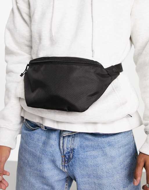 ASOS DESIGN cross body fanny pack with contrast puller in black