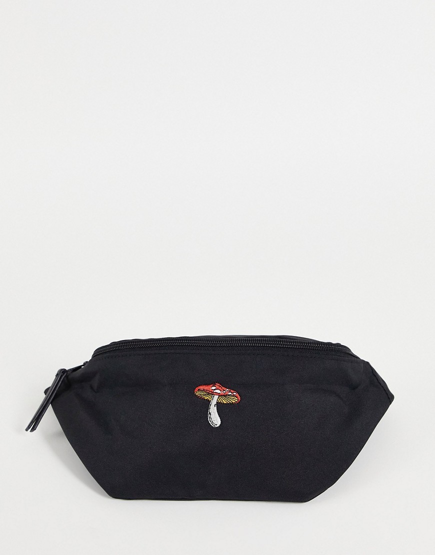 ASOS DESIGN cross body fanny pack in black nylon with mushroom embroidery