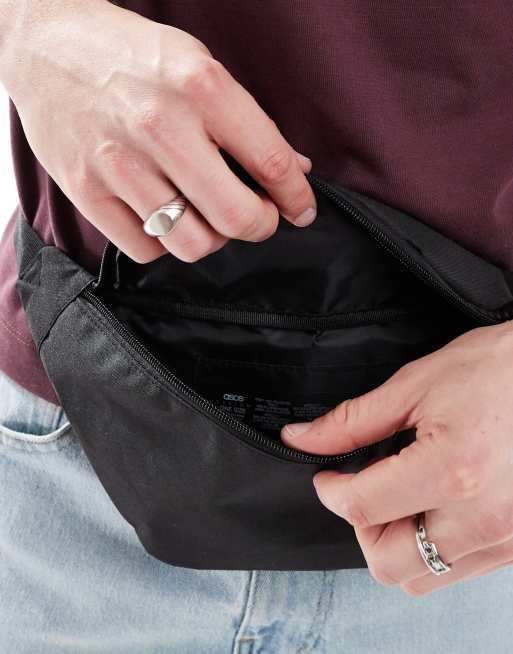 ASOS DESIGN cross body bum bag with contrast puller in black
