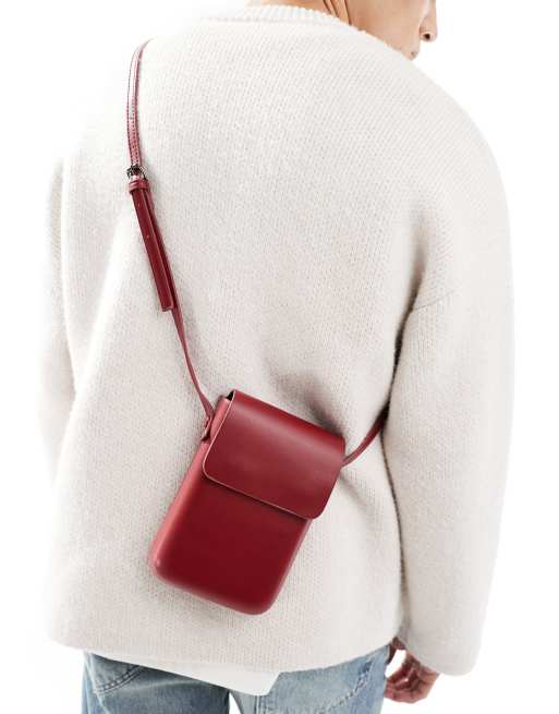 ASOS DESIGN cross body flight bag in burgundy ASOS