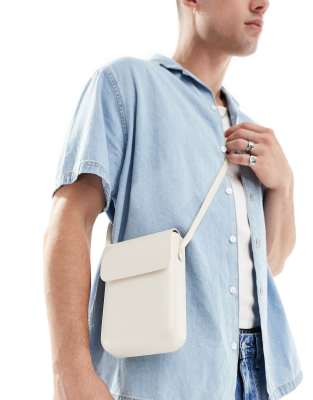 ASOS DESIGN ASOS DESIGN cross body flight bag in ecru-White