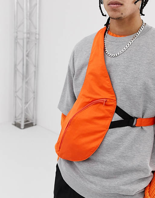 ASOS DESIGN cross body harness bag in orange
