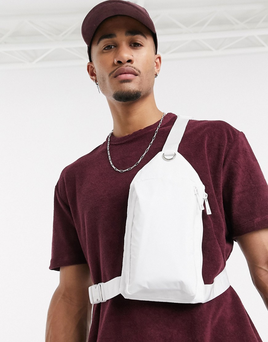 ASOS DESIGN cross body harness bag in white faux leather with metal detail
