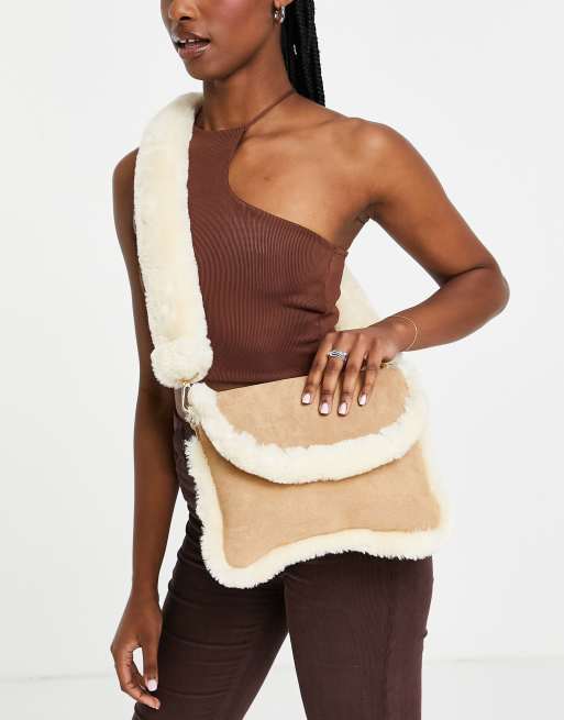 ASOS DESIGN cross body messenger bag in faux shearling