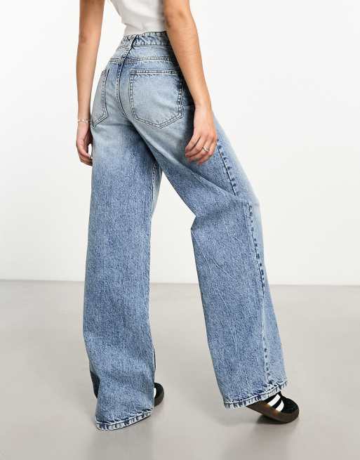 ASOS DESIGN cross front wide leg jeans in mid blue ASOS