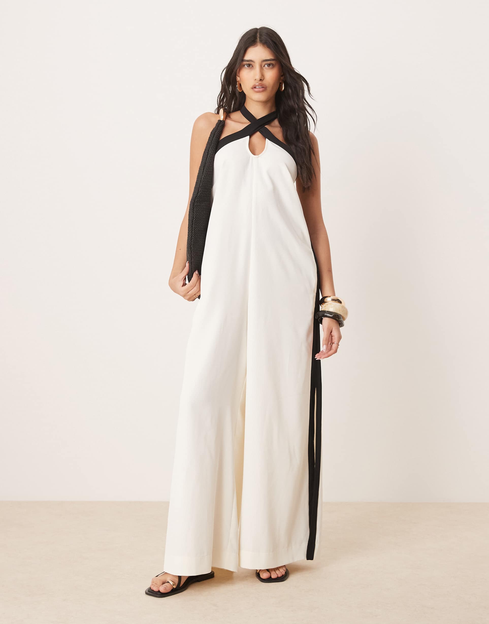 asos design cross halter contrast split leg jumpsuit in cream