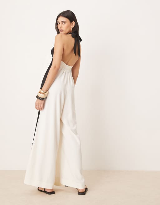 ASOS DESIGN cross halter contrast split leg jumpsuit in cream