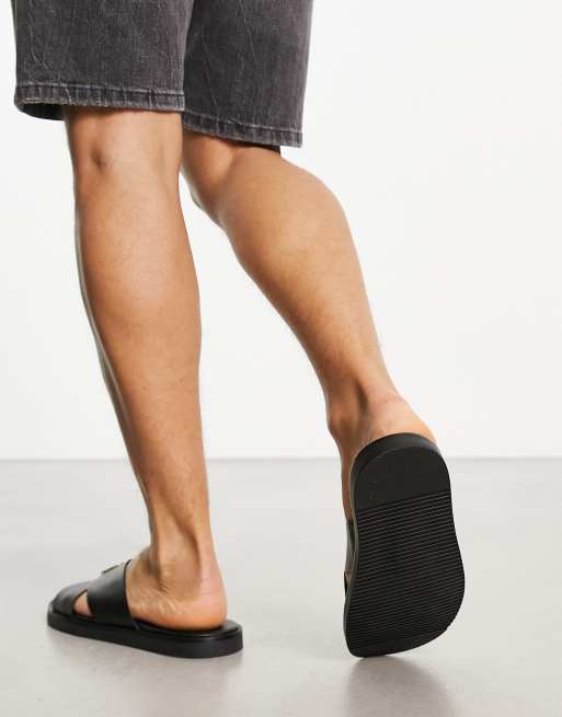 ASOS DESIGN cross strap sandals in black saffiano leather with badge | ASOS