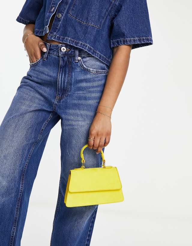 ASOS DESIGN crossbody bag in suedette with top handle and detachable strap in mustard