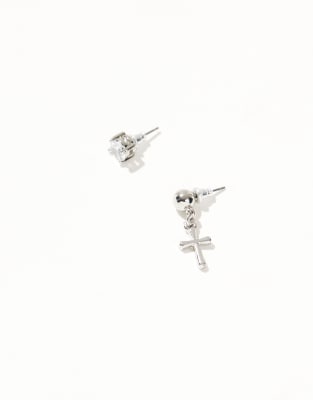 crystal stud and drop earring with cross in silver tone