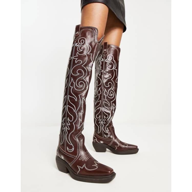 https://images.asos-media.com/products/asos-design-cuba-premium-leather-swirl-stitch-western-knee-boot-in-brown/203670459-1-chocleather?$n_750w$&wid=750&hei=750&fit=crop