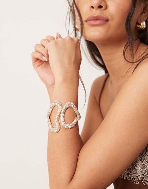 ASOS DESIGN cuff bracelet with abstract crystal detail in gold tone - view 1