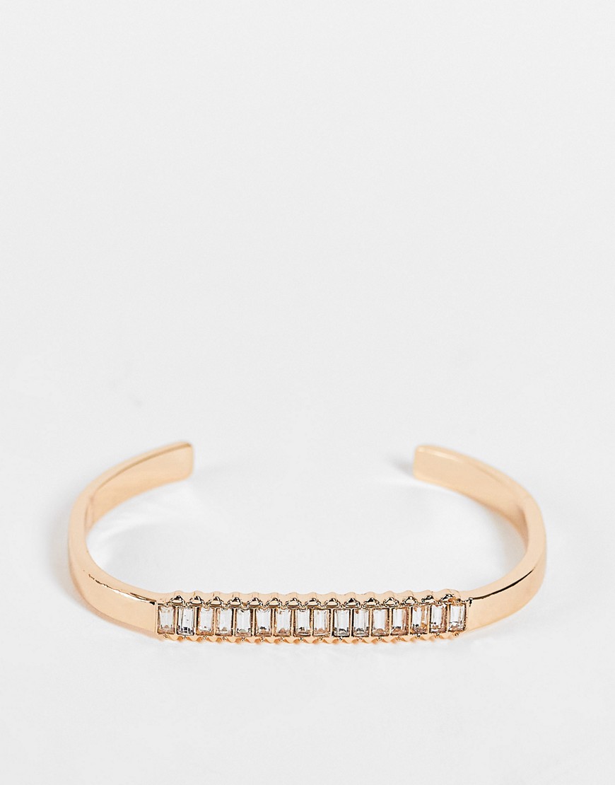 ASOS DESIGN cuff bracelet with baguette crystal in gold tone