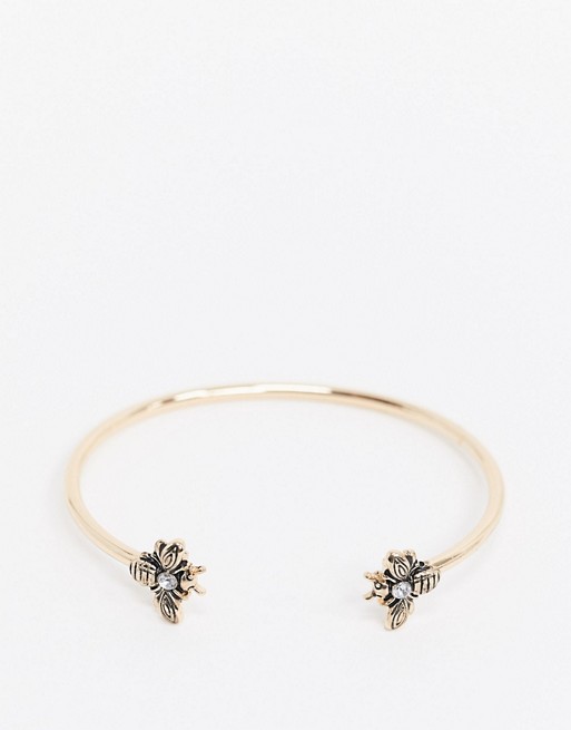 ASOS DESIGN cuff bracelet with engraved crystal bee in gold tone