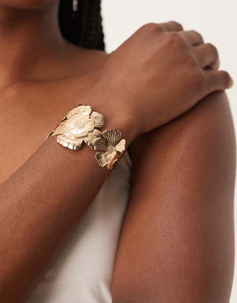 ASOS DESIGN cuff bracelet with floral detail in gold tone - view 1
