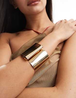 ASOS DESIGN cuff bracelet with folded detail in gold tone