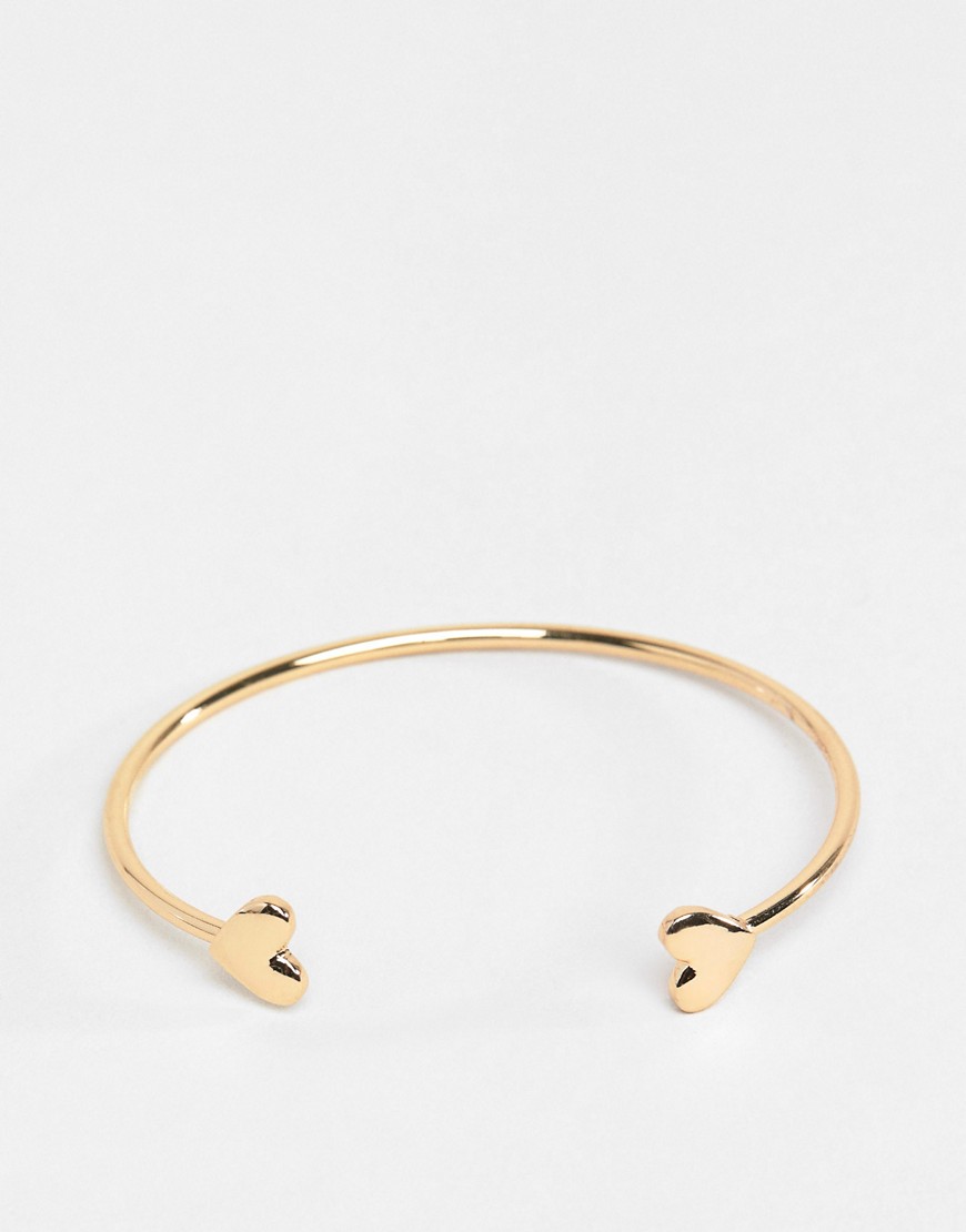 ASOS DESIGN cuff bracelet with heart detail in gold