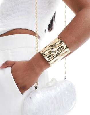 ASOS DESIGN cuff bracelet with molten design in gold tone