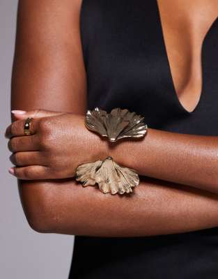 cuff bracelet with textured petal detail in gold tone