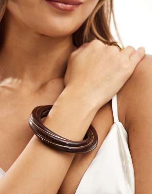 ASOS DESIGN ASOS DESIGN cuff bracelet with twist resin detail in brown-Gold
