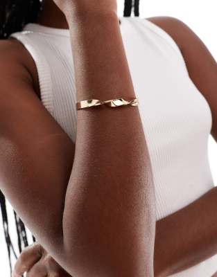 ASOS DESIGN ASOS DESIGN cuff bracelet with twisted detail in gold tone