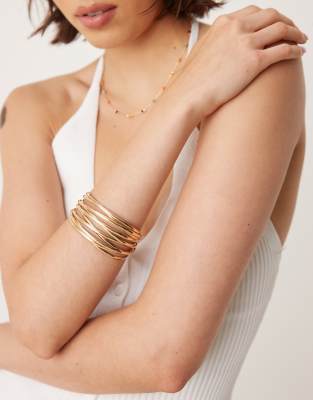 cuff bracelet with wire design in gold tone