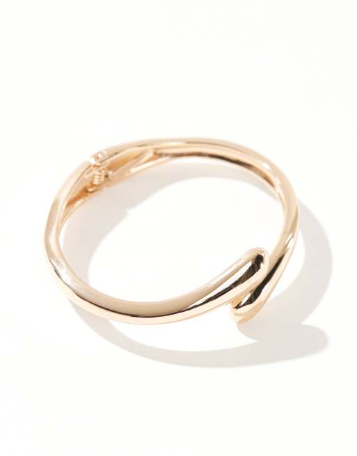 ASOS DESIGN cuff bracelet with wrap around design in gold tone, 2 of 4