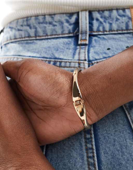 ASOS DESIGN cuff bracelet with wrap around design in gold tone, 3 of 4
