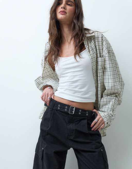 ASOS DESIGN cuffed hem cargo pants with grommet belt in black, 2 of 5