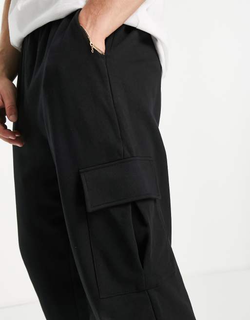 ASOS DESIGN cuffed joggers with cargo pockets in black - BLACK | ASOS