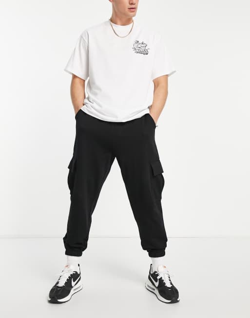 ASOS DESIGN cuffed joggers with cargo pockets in black - BLACK | ASOS