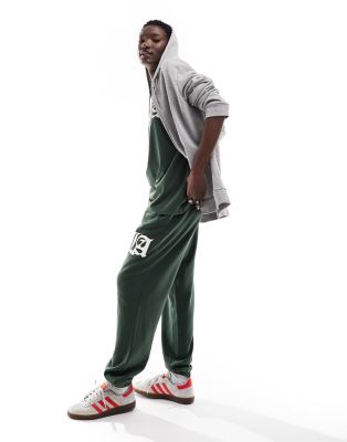 Asos Design Cuffed Sweatpants With La Graphic In Washed Green