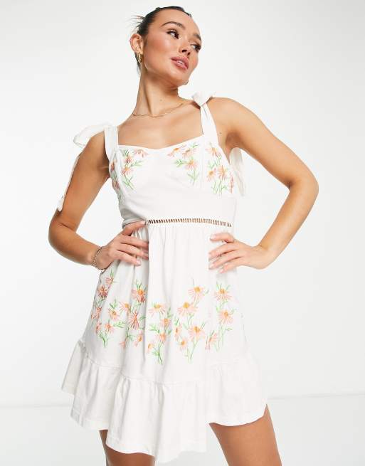 ASOS DESIGN cup detail sundress with tie shoulders in cream with coral floral embroidery