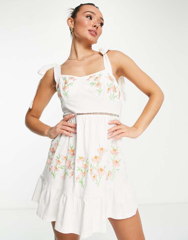 ASOS DESIGN cup detail sundress with tie shoulders with cream and coral floral embroidery