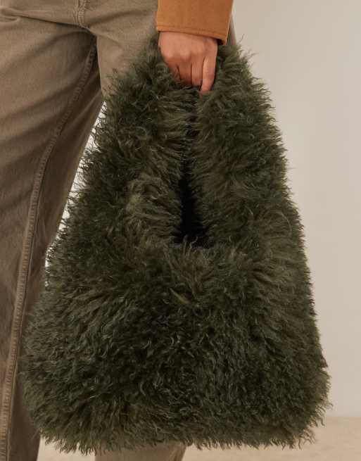 ASOS DESIGN curly faux fur tote bag in khaki green