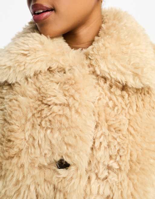 ASOS DESIGN curly faux sheepskin jacket in sand