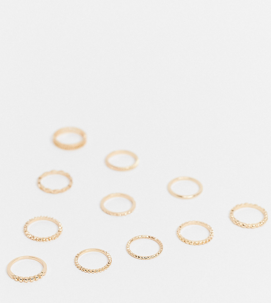 ASOS DESIGN Curve – 11-pack guldfärgade ringar med blandade vävda och utskurna designer