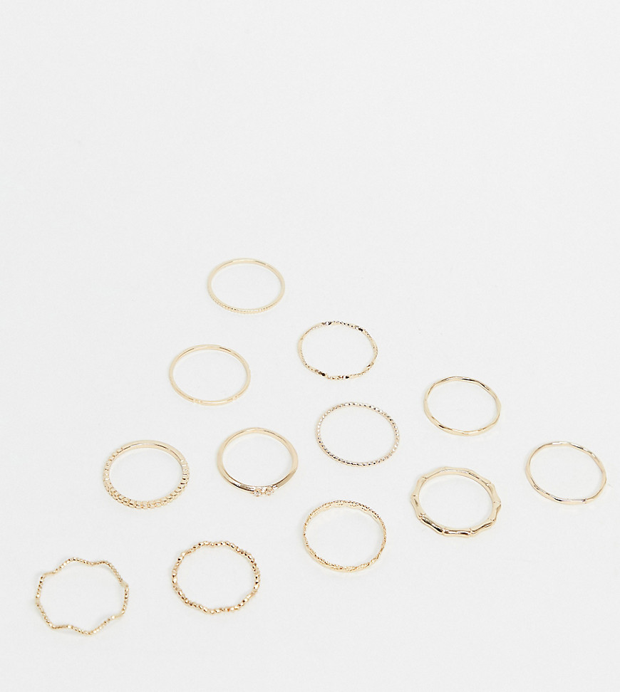 ASOS DESIGN Curve – 12-pack guldfärgade ringar med tvinnade och graverade modeller