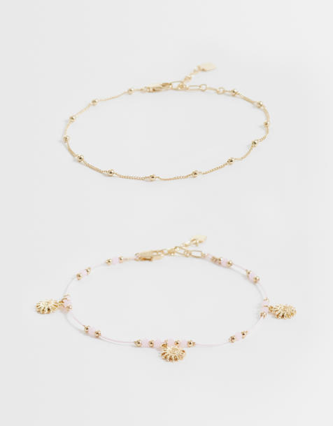 ASOS DESIGN Curve – 2er-Pack Perlen-Fußkettchen in Rosa und Goldoptik mit Sonnenanhängern - view 1