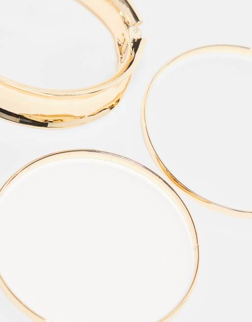 ASOS DESIGN Curve – 3er-Pack goldfarbene Armreife in verschiedenen Größen, 2 von 4
