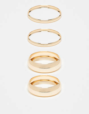 ASOS DESIGN Curve - 4er-Pack glänzende Armreife in Goldoptik-Goldfarben