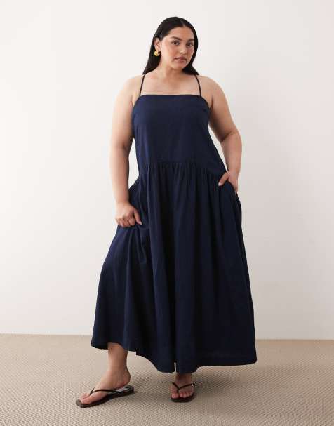 ASOS DESIGN Curve - Aangerimpelde denim midi jurk met zijzakken in inktblauwe wassing - view 1