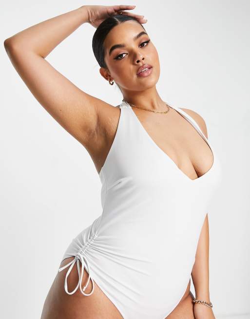 ASOS DESIGN Curve adjustable leg halter swimsuit in white