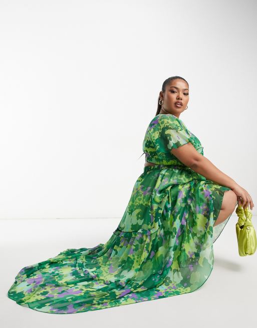 ASOS DESIGN Curve angel sleeve plunge tiered maxi dress with cut out in green blurred floral print