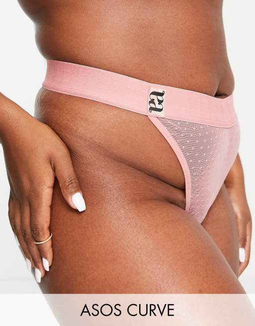 ASOS DESIGN Curve – Aria – Malibu-Tanga aus gepunktetem Netzstoff in Pfirsich mit Zierband