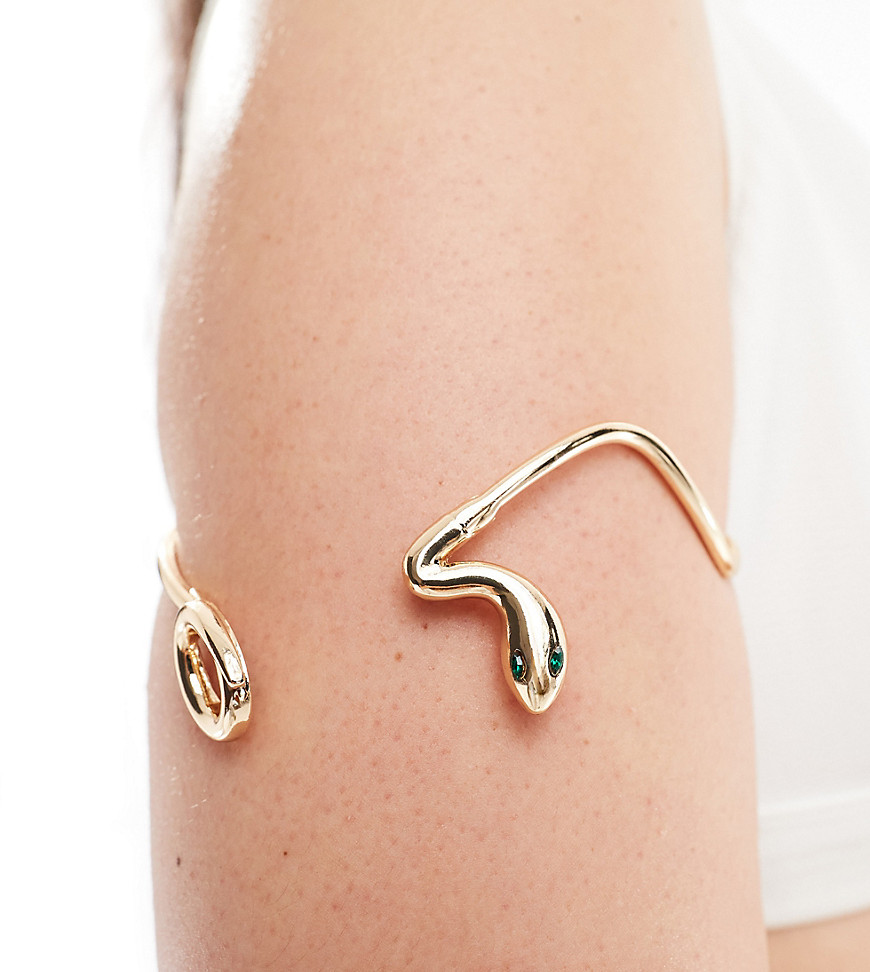 ASOS DESIGN Curve arm cuff with wraparound snake design in gold tone