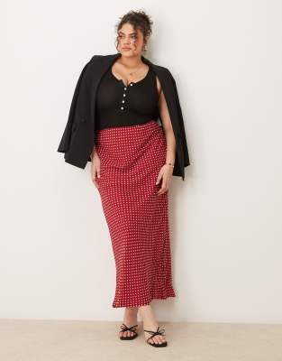 ASOS DESIGN Curve - Asymmetrischer Maxirock aus Chiffon in Rot mit Punkten