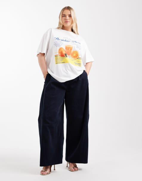 ASOS DESIGN Curve baby cord extreme horseshoe trousers with seam detail in Navy - view 1
