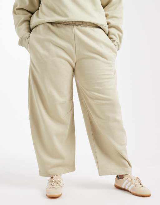 ASOS DESIGN Curve barrel leg brushback trackies in olive green, 2 of 5